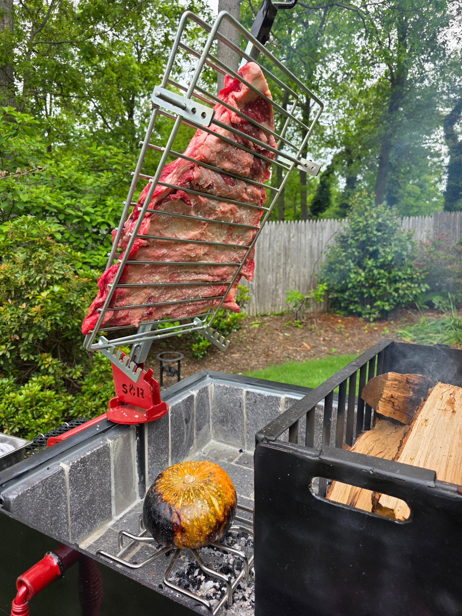 Iron Cross Asado whole animal live fire